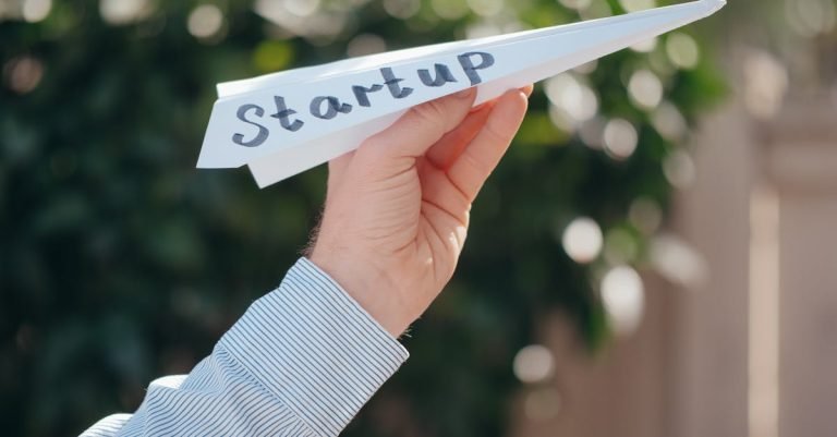 Startup team using AI tools for faster ad launches and creative efficiency.